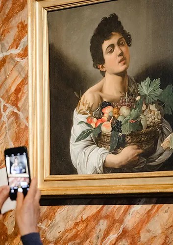 Boy with a Basket of Fruit