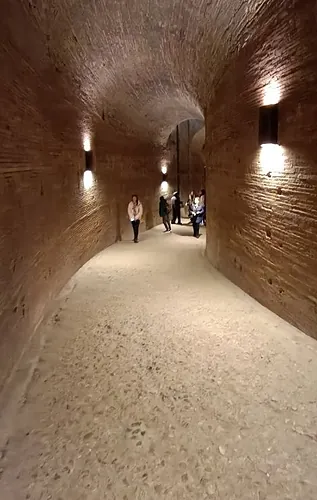 Through the fortress passageways.